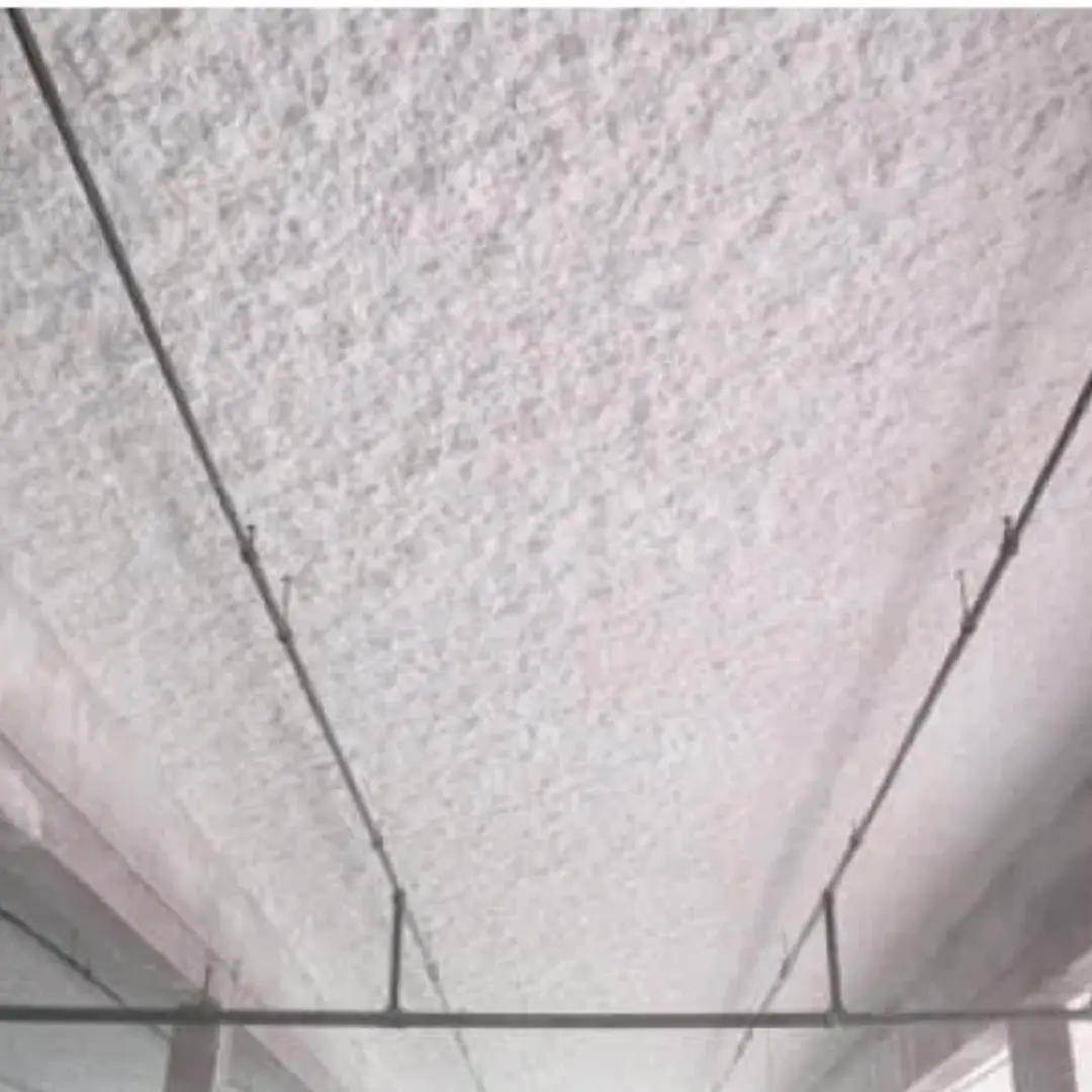 Acoustic Sonoglass spray coating on ceiling with sprinkler pipes in a modern building.